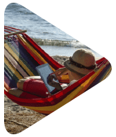 Portable Child in a hammock on a beach